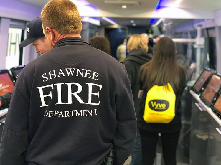 A member of the Shawnee Fire Department attends a Vyve event