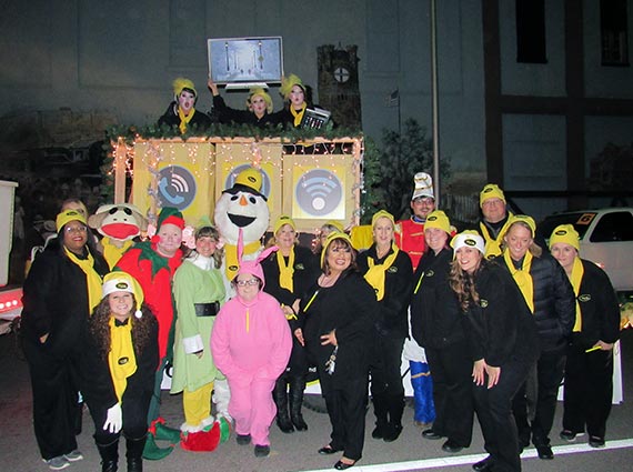 Vyve employees pose for a picture during the Shawnee Christmas Parade